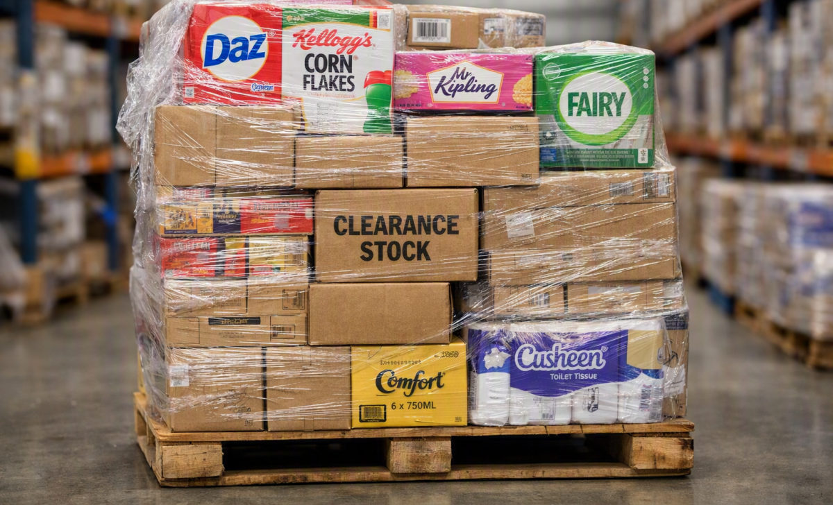 A mixed clearance-stock pallet of grocery and household goods
